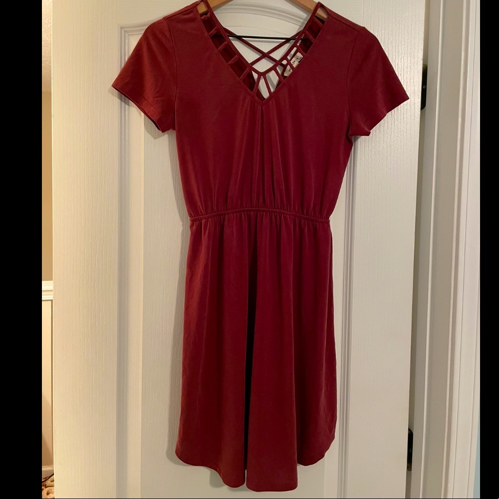 Boutique red dress with small cutout patterns